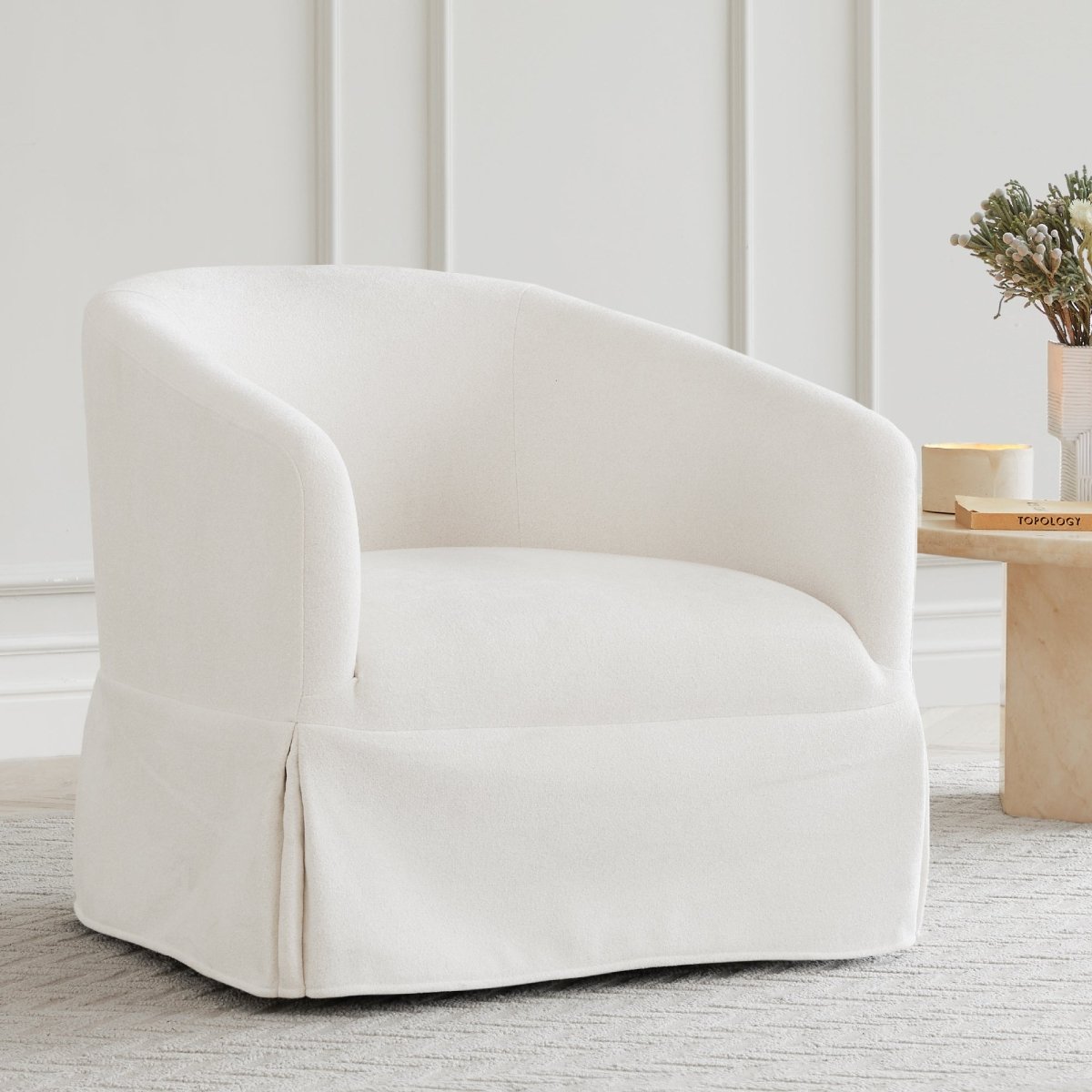 EllaGrace slipcovered swivel armchair in white, ideal for stylish living spaces - CHITA Living