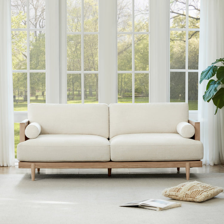 Julane Modern 3-Seater Cane Sofa in light fabric with wooden legs and round cushions - CHITA Living