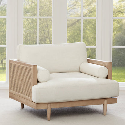 Julane modern cane armchair with light fabric and natural wood frame - CHITA Living