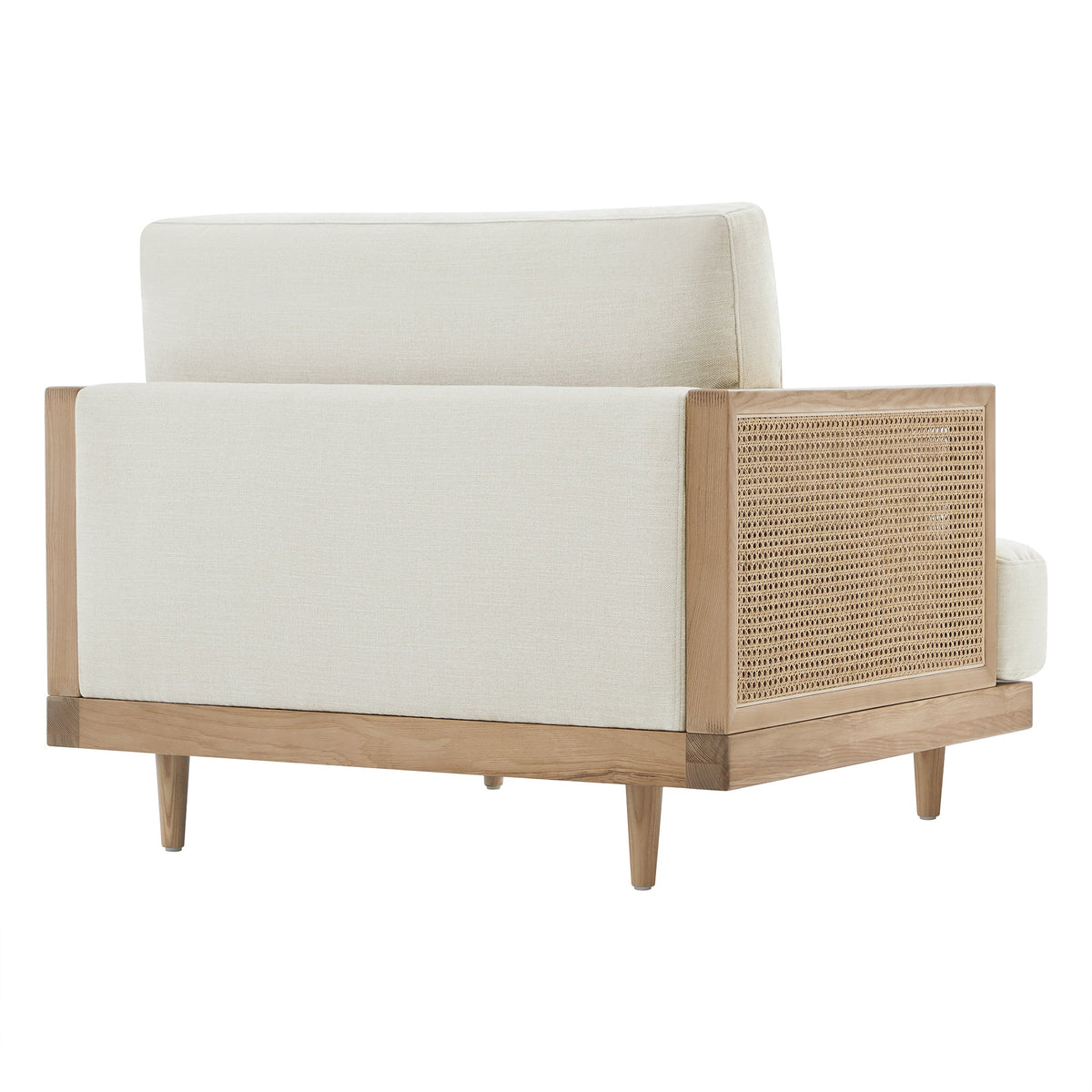 Julane modern cane armchair with rattan back and light upholstery from the back view - CHITA Living