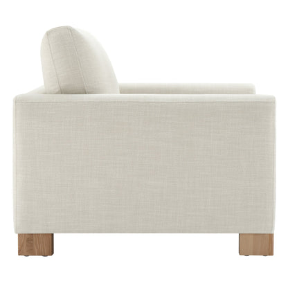 Side view of Keaton Armchair featuring soft fabric upholstery and solid wood legs - CHITA Living