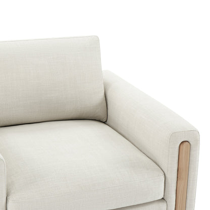 Light gray Keaton Armchair with plush seat and natural wood side frame - CHITA Living